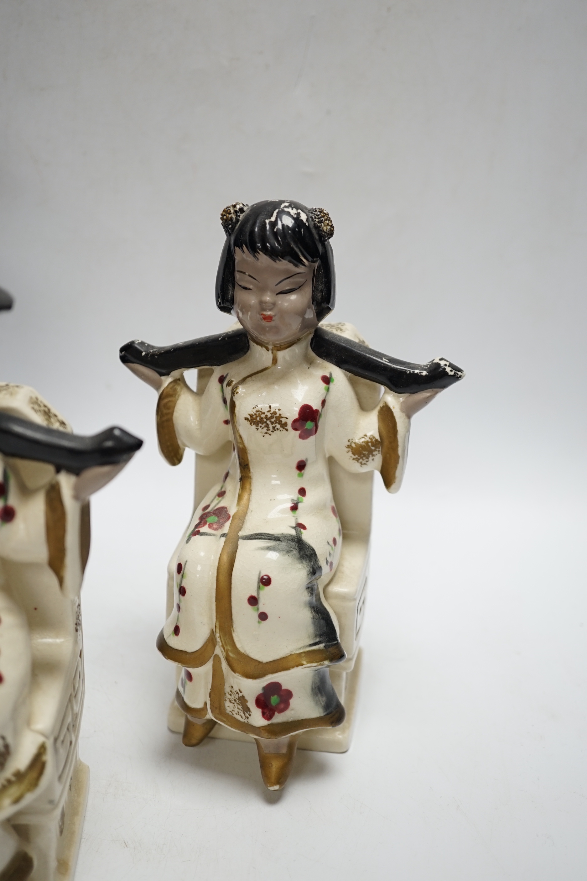 A pair of Japanese earthenware bookends and a Japanese cloisonné enamel vase, decorated in the musen and silver wire technique, vase 30cm